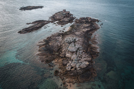 Natural landscape of the rocky beach and seascape along the Brittany coastline, CÃ´te de granite rose or Pink Granite Coast in Franceの写真素材