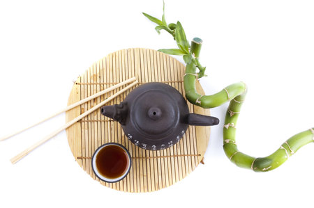 tea set and a branch of bambooの写真素材