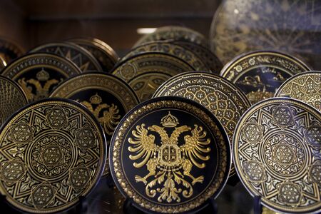 Toledo damask decoration in gold and black. It's a tradition technique to make jewel and decorationの写真素材