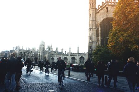 College of Corpus Christi and the Blessed Virgin Mary in Cambrid. Green grass and lake.の写真素材