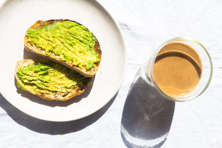 Sliced avocado on toast bread
