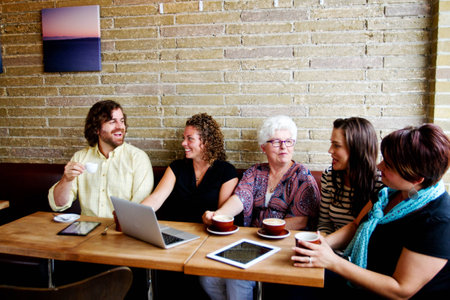 Friends visiting in coffee shop