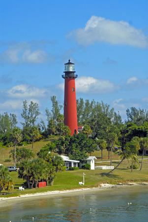 Scenic Lighthouse Across the Bayの写真素材
