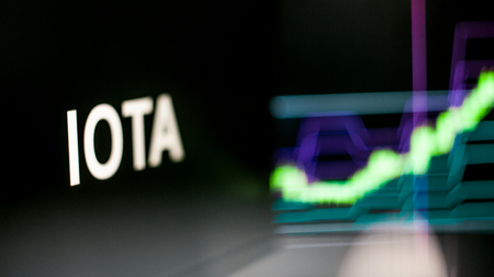 IOTA Cryptocurrency token. Rise in price and Growth of quotations, the green graph up. The behavior of the cryptocurrency exchanges, concept. Modern financial technologies.の写真素材