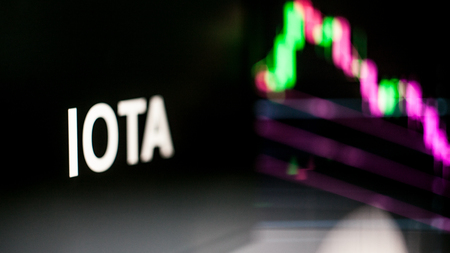 IOTA Cryptocurrency token. crisis and the collapse of prices, the red graph down. The behavior of the cryptocurrency exchanges, concept. Modern financial technologies.の写真素材