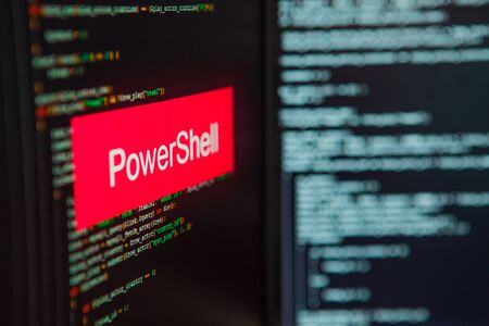 Programming language, PowerShell inscription on the background of computer code. Modern digital technologies and programming trainingの写真素材