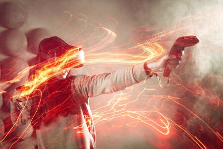 girl playing VR games, concept of modern technology, effect of double exposure. A young cheerful...