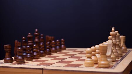 A game of chess, the beginning of a chess game two sides opposite each other. Business rivalry and...