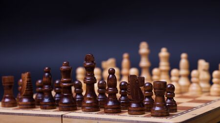 A game of chess, the beginning of a chess game two sides opposite each other. Business rivalry and...