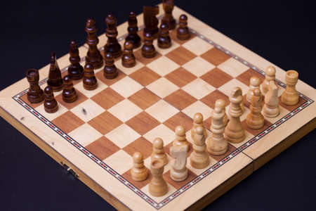 A game of chess, the beginning of a chess game two sides opposite each other. Business rivalry and planning, concept top viewの写真素材