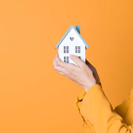 Real estate insurance, taking care of your home and family, concept. Financial and investment...