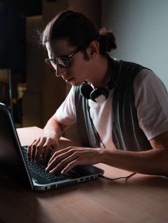 Write code and learn programming languages. A student or specialist is doing a project.の写真素材