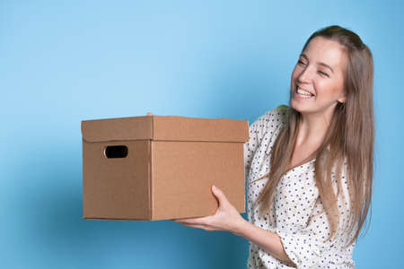 Box with a parcel, small business and delivery of goods from online stores.の写真素材