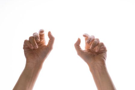 Hand gestures. Elegant womens hands catch something that falls from above,の写真素材