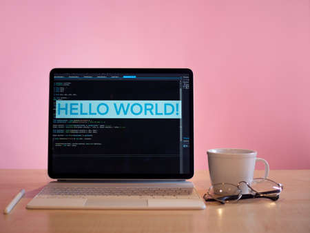 a minimalistic workplace for a designer or developer. A laptopの写真素材