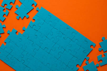 A set of puzzles, the process of collecting in a large pattern. Teamwork and problem solving, concept.の写真素材