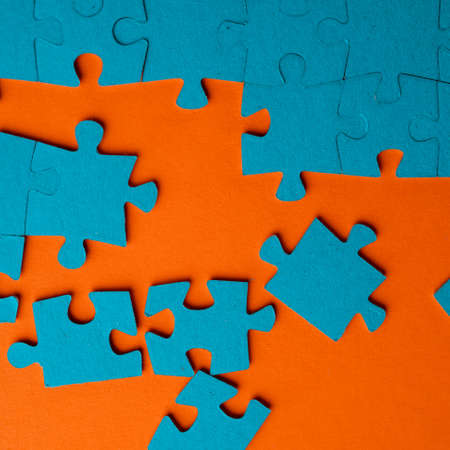 A set of puzzles, the process of collecting in a large pattern. Teamwork and problem solving, concept.の写真素材