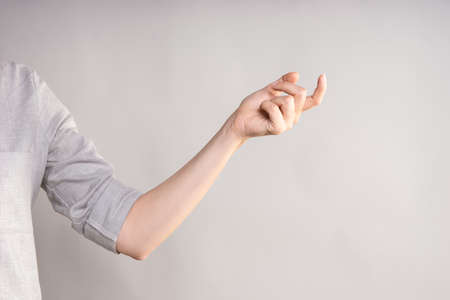 Hand gestures, Poke your finger, point to the side.の写真素材