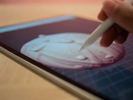 3D modeling in a mobile application, the authors hand creates a modelの写真素材