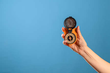 Help in navigating the terrain, find your location, concept. Magnetic compassの写真素材