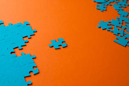 From chaos to order, concept. One moves from a bad team to a good one, labor migration, career growth. The puzzle element moves from an unstructured handful of puzzles to a properly assembled puzzle.の写真素材