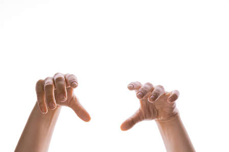 Hands of the puppeteer for editing, hands hanging from above, isolated on a white background, Hand gesturesの写真素材