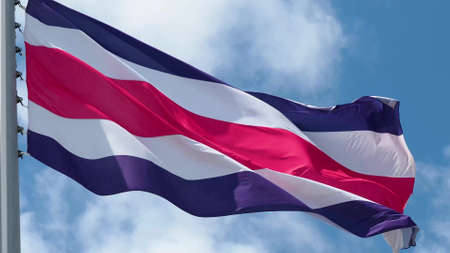 Costa Rica, flag is fluttering in the wind photo on the background of the sky, outdoors. National flagの写真素材