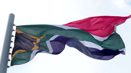 South Africa, flag is fluttering in the wind photo on the background of the sky, outdoors. National flagの写真素材