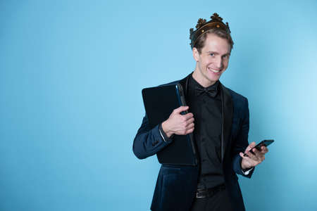 successful manager became the best by closing a good deal. Successful careerist, concept. Businessman in the crownの写真素材