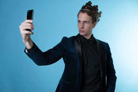 To become the best, the concept of a careerist. Businessman in a crown, ambitious managerの写真素材