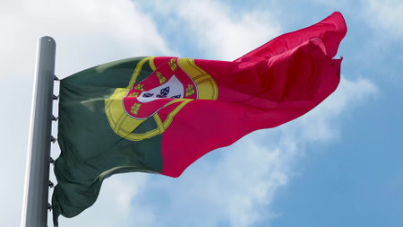 Portugal, flag is fluttering in the wind photo on the background of the sky, outdoors. National flagの写真素材