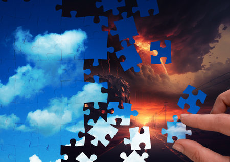 Create peace and prosperity instead of wars and cataclysms, concept. A clear sky of puzzles on top of an apocalyptic landscape. mixed mediaの写真素材
