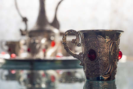 Silver tea service in a home setting.の写真素材