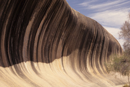 Wave Rock is a natural rock formation that is shaped like a tall breaking ocean waveの写真素材