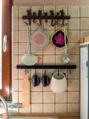 Kitchen wall with everyday and ornamental objects.の写真素材