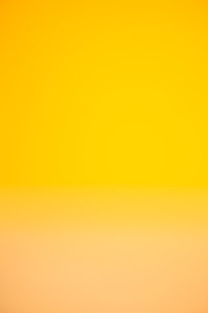 Abstract soft colors of yellow gradient background.の写真素材