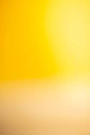 Magic abstract soft colors of shining yellow gradient studio background.の写真素材