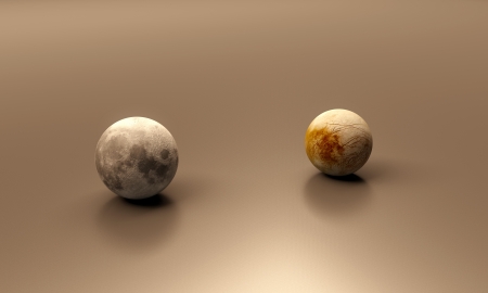 A rendered size comparison of the Jupiter Moon Europa and the Earth Moon.の写真素材