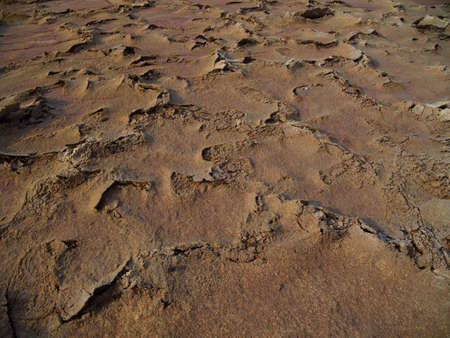Closeup of rock patterns dried earth forming Mars like landscape in Danakil Depression in Ethiopia.