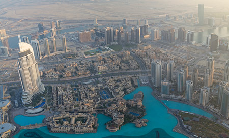 Panorama of buildings and fountains in the city of Dubai from the Burj Khalifa, the tallest building...