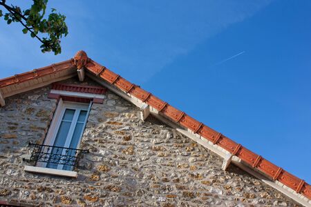 Close-up view of house'roof in France with nice skyの写真素材