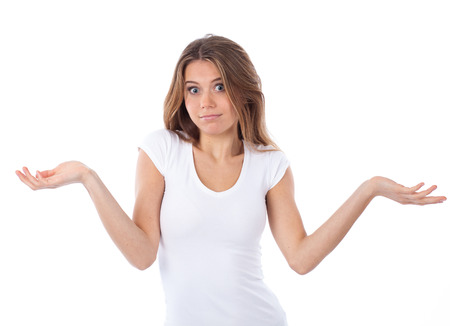 Portrait of a nice woman having a doubting gesture, isolated on whiteの写真素材