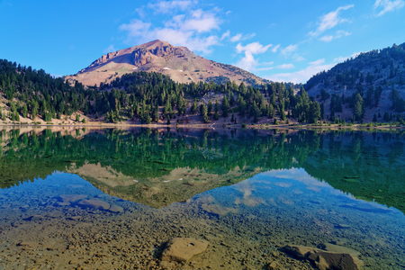 Reflections off Lake Helen in Lassen Volcanic National Park, Californiaの写真素材