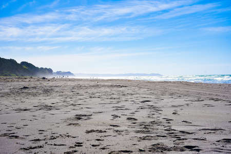 A sunny day on an east coast beach in the North Island of New Zealandの写真素材
