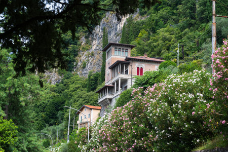 Traditional Italian homes along the mountainsides surrounding Lake Comoの写真素材
