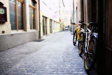 Bikes in an alleyの写真素材