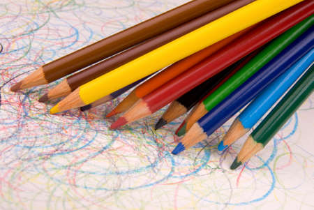 Assortment of colored pencils drawing on a white background