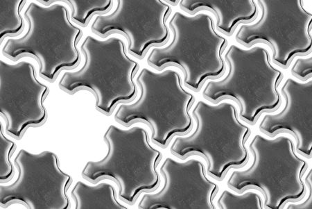 metal puzzle pieces on a white backgroundの写真素材