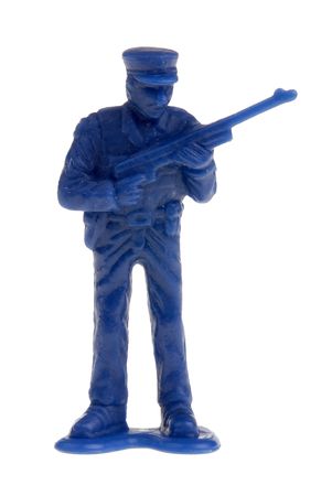 plastic toy police officer doll with a shotgunの写真素材