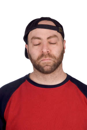 sleeping male baseball fan with baseball hat and tishirt, over whiteの写真素材